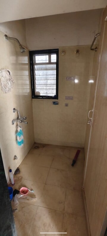 Bathroom in 1 BHK Apartment at Puranik City, Kasarvadavali – for Rent