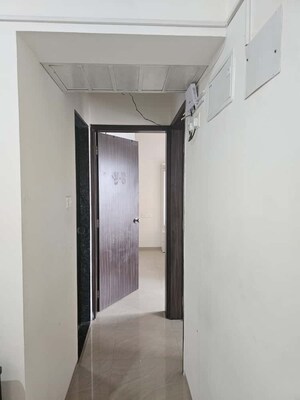 Building Lobby in 2 BHK Apartment at Kuber Imperia, Wakad – for Rent