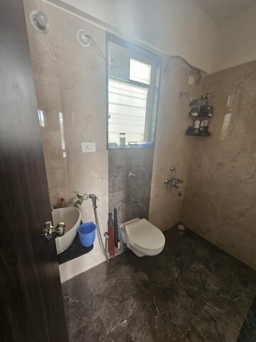 Bathroom in 2 BHK Apartment at Kuber Imperia, Wakad – for Rent
