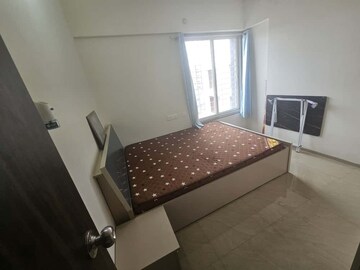 Bedroom in 2 BHK Apartment at Kuber Imperia, Wakad – for Rent