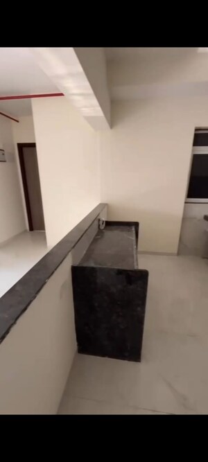 Kitchen in 2 BHK Apartment at Anant Metropolis Insignia Towers, Kasarvadavali – for Sale