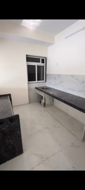 Kitchen in 2 BHK Apartment at Anant Metropolis Insignia Towers, Kasarvadavali – for Sale