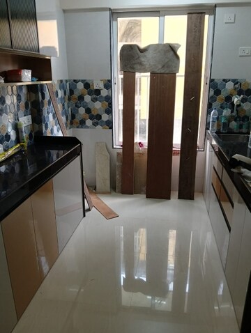 Kitchen in 2 BHK Apartment at Colo Color Rise, Dadar West – for Rent