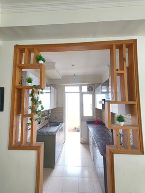 Kitchen in 2 BHK Apartment at Amrapali Silicon City, Sector 76 – for Rent