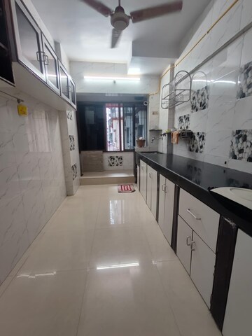 Kitchen in 2 BHK Apartment at Pleasant CHS Malad, Malad West – for Rent