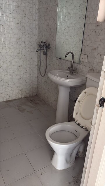 Bathroom in 2.5 BHK Apartment at Gaur City 2 - 12th Avenue, Sector 16c Greater Noida – for Sale