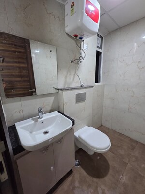 Bathroom in 2.5 BHK Builder Floor at Smart World Gems, Sector 89 – for Rent