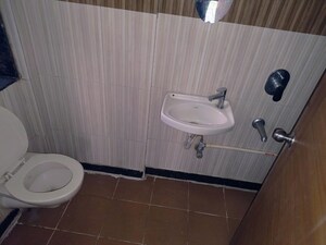 Bathroom in 1 BHK Apartment at Asha Ashok Smruti, Vadavali – for Rent