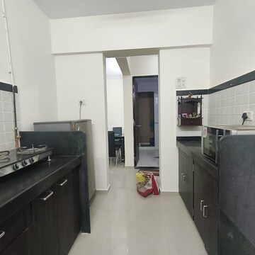 Kitchen in 2 BHK Apartment at Mahavir Kalpavruksha, Ghodbunder Road – for Rent