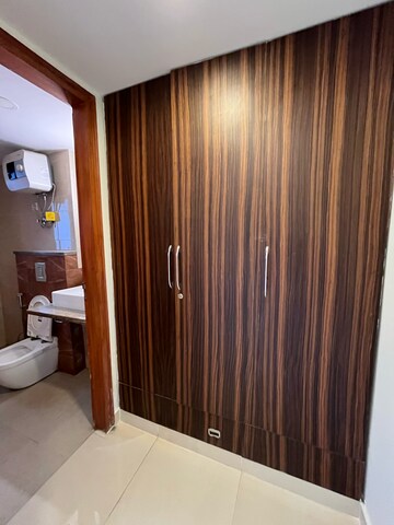 Bedroom in 3 BHK Builder Floor at Ansal Sushant Lok I, Sector 43 – for Rent