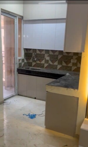 Kitchen in 2 BHK Apartment at MRG The Balcony, Sector 93 – for Rent