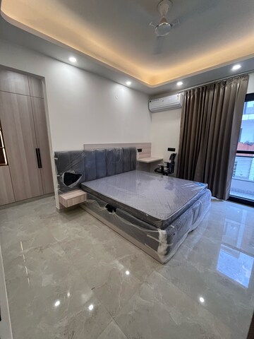 Bedroom in 3 BHK Builder Floor at Ansal Sushant Lok I, Sector 43 – for Rent