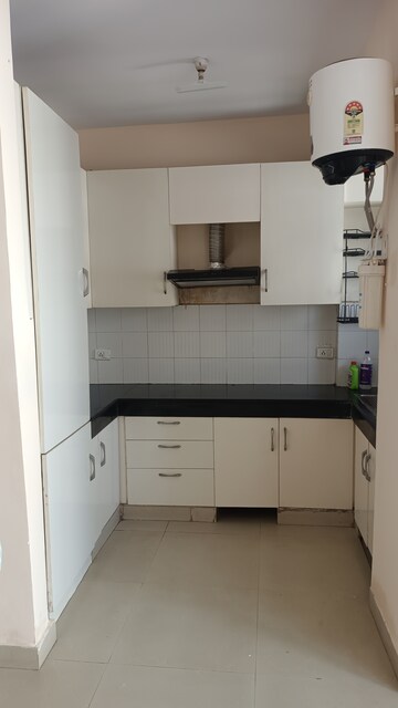 Kitchen in 2 BHK Apartment at Aditya Celebrity Homes, Sector 76 – for Rent