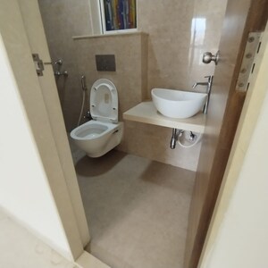 Bathroom in 1 BHK Apartment at JP Eminence, Andheri West – for Rent