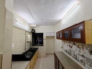 Kitchen in 2 BHK Apartment at Siddhi Highland Park, Kolshet Road – for Rent