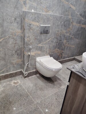 Bathroom in 1.5 BHK Builder Floor at Kalkaji – for Sale