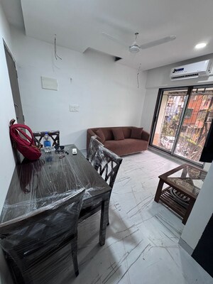 Living Room in 1 BHK Apartment at Lak The Residency, Andheri West – for Rent