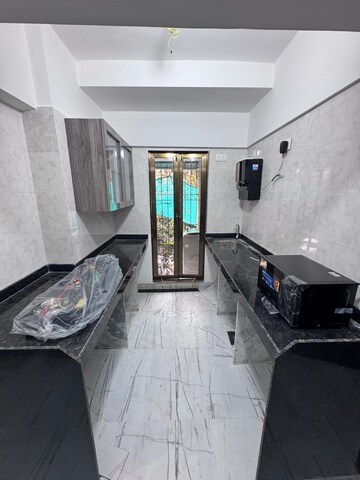 Kitchen in 1 BHK Apartment at Lak The Residency, Andheri West – for Rent