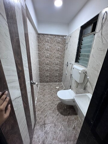 Bathroom in 1 BHK Apartment at Lak The Residency, Andheri West – for Rent