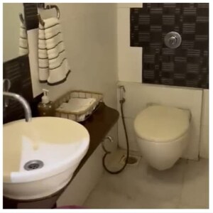 Bathroom in 2 BHK Apartment at Magnum Tower CHS, Andheri West – for Rent