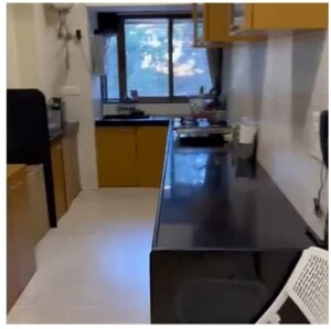 Kitchen in 2 BHK Apartment at Magnum Tower CHS, Andheri West – for Rent