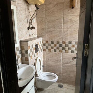 Bathroom in 3 BHK Builder Floor at Dwarka Sector 16 – for Sale