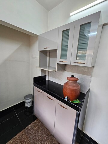 Kitchen in 1 BHK Apartment at KM Horizon Exotica, Haware City – for Rent