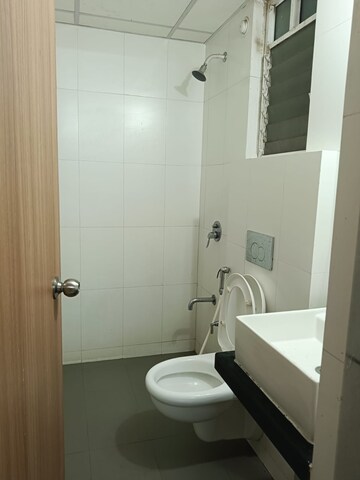 Bathroom in 1 BHK Apartment at Lodha Amara, Kolshet Road – for Rent
