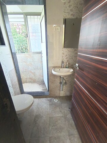 Bathroom in 2 BHK Apartment at Vedant Sumeet Elegance 360, Manpada – for Sale