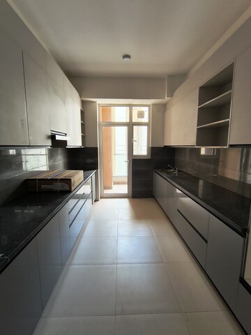 Kitchen in 3 BHK Apartment at Adani Samsara Vilasa, Sector 63 – for Rent
