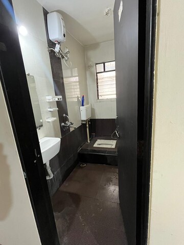 Kitchen in 2 BHK Apartment at Aarav Windchimes, Kharadi – for Rent