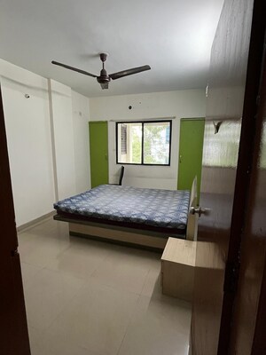 Bedroom in 2 BHK Apartment at Aarav Windchimes, Kharadi – for Rent