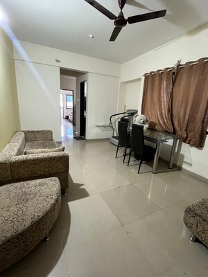 Living Room in 2 BHK Apartment at Aarav Windchimes, Kharadi – for Rent
