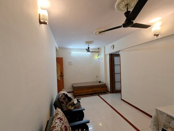 Living Room in 2 BHK Apartment at Green Acres Apartment, Waghbil – for Rent