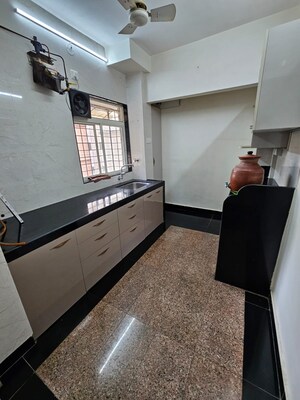 Kitchen in 2 BHK Apartment at Om Sai Plaza, Ghodbunder Road – for Rent