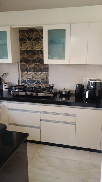 Kitchen in 1 BHK Apartment at K Raheja Palm Court, Malad West – for Rent