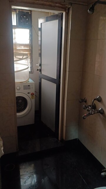 Bathroom in 1 BHK Apartment at K Raheja Palm Court, Malad West – for Rent