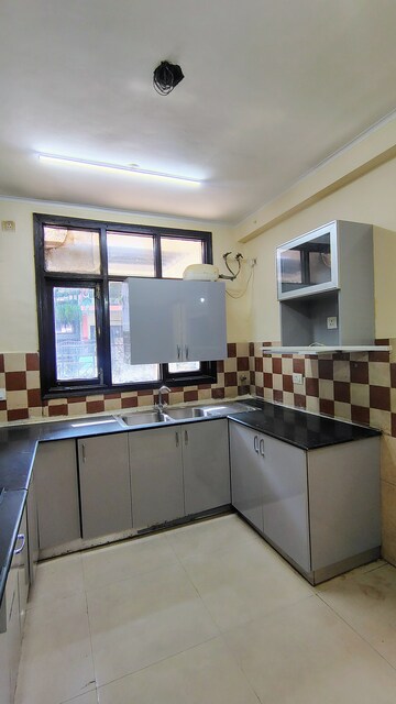 Kitchen in 3 BHK Builder Floor at Hong Kong Bazaar, Sector 57 – for Rent