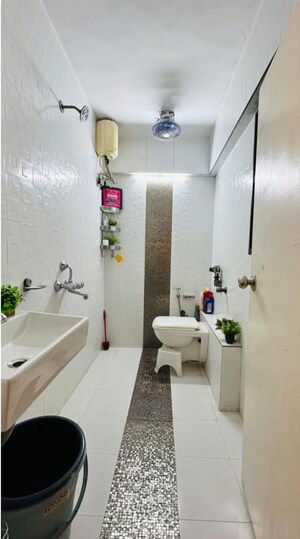 Bathroom in 3 BHK Apartment at Sky Anchorage, Versova – for Rent