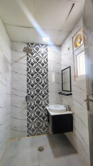 Bathroom in 3 BHK Builder Floor at Hong Kong Bazaar, Sector 57 – for Rent