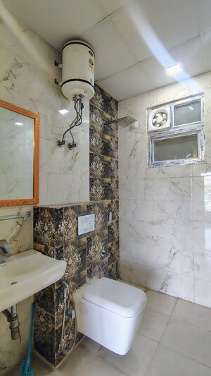 Bathroom in 3 BHK Builder Floor at Hong Kong Bazaar, Sector 57 – for Rent