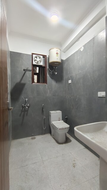 Bathroom in 3 BHK Builder Floor at Palm Residency Chhatarpur, Chattarpur – for Rent