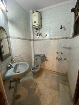 Bathroom in 3 BHK Builder Floor at Paschim Vihar – for Rent