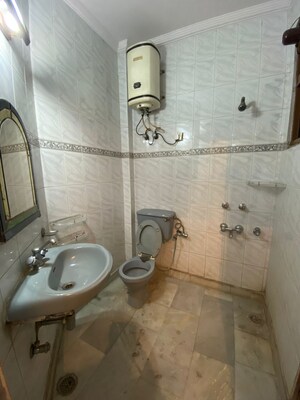 Bathroom in 3 BHK Builder Floor at Paschim Vihar – for Rent