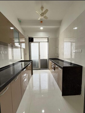 Kitchen in 2 BHK Apartment at Shreeji Atlantis, Malad West – for Rent