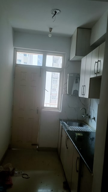 Kitchen in 2 BHK Apartment at Supertech Cape Town, Sector 74 – for Rent
