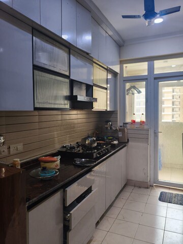 Kitchen in 3 BHK Apartment at Amrapali Crystal Homes, Sector 76 – for Rent