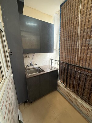 Kitchen in 3 BHK Apartment at Amrapali Crystal Homes, Sector 76 – for Rent