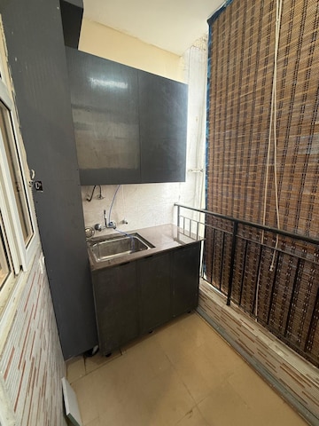 Kitchen in 3 BHK Apartment at Amrapali Crystal Homes, Sector 76 – for Rent