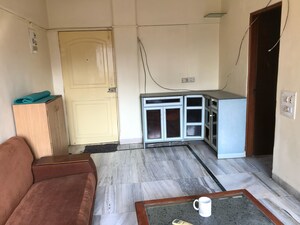 Kitchen in 2 BHK Apartment at Gokuldham Saidham CHS, Goregaon East – for Rent